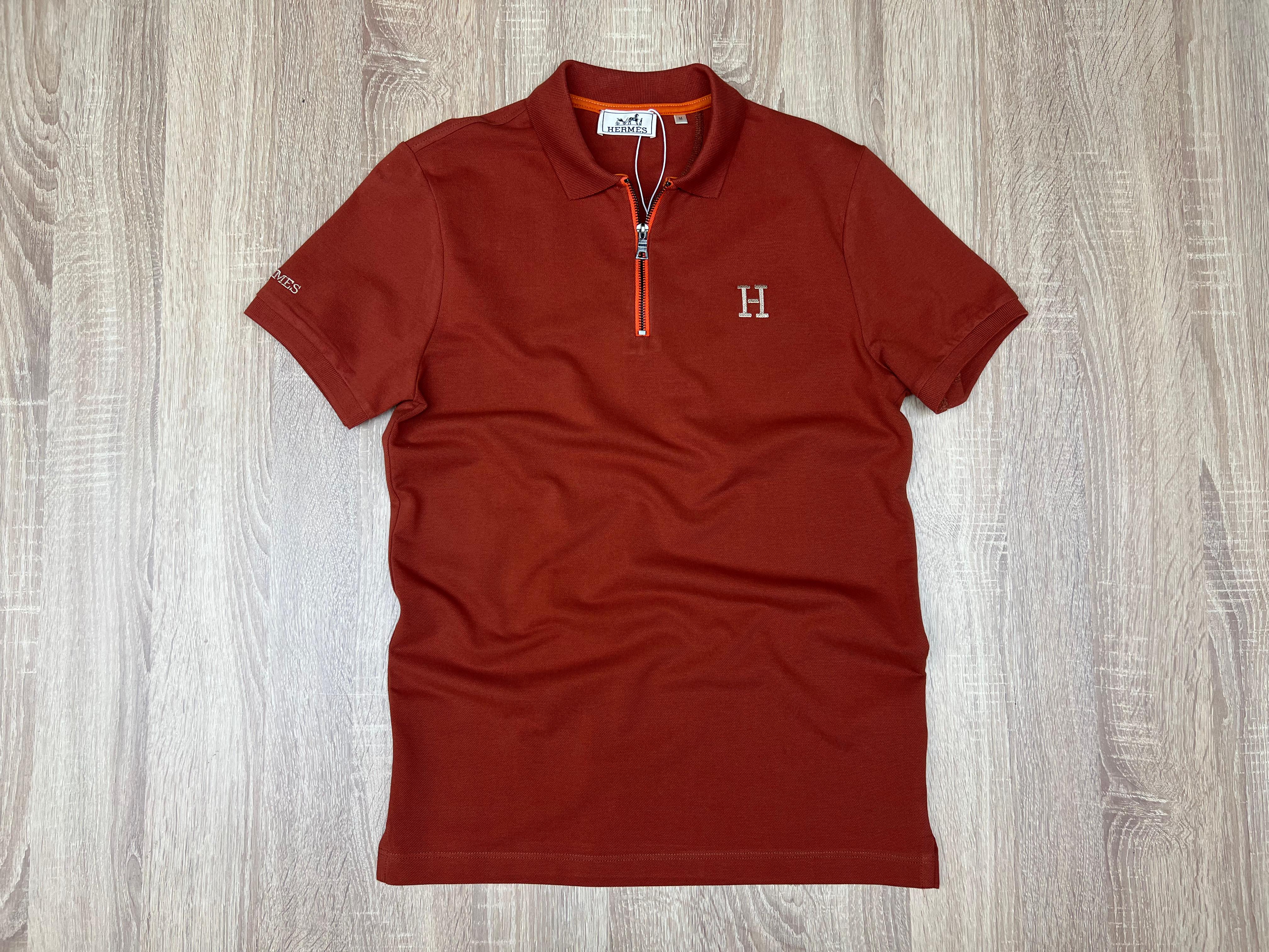 POLO HERMES AVEC ZIPPE ROUGE BRIQUE