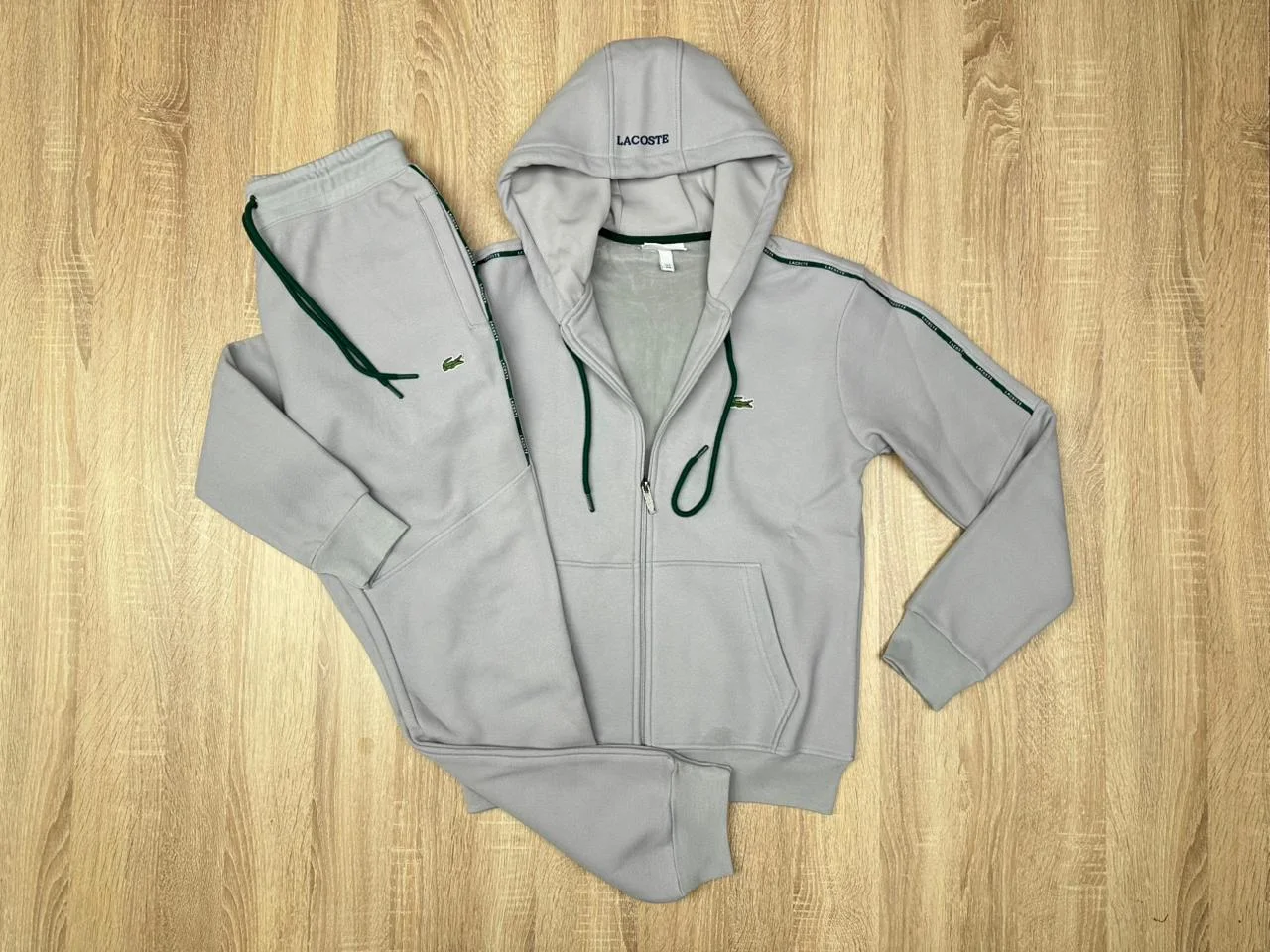 SURVETTE LACOSTE AVEC CAPUCH NV GRIS