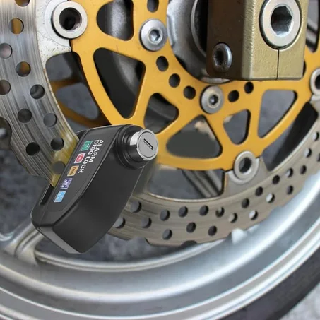 Motorcycle alarm disk lock