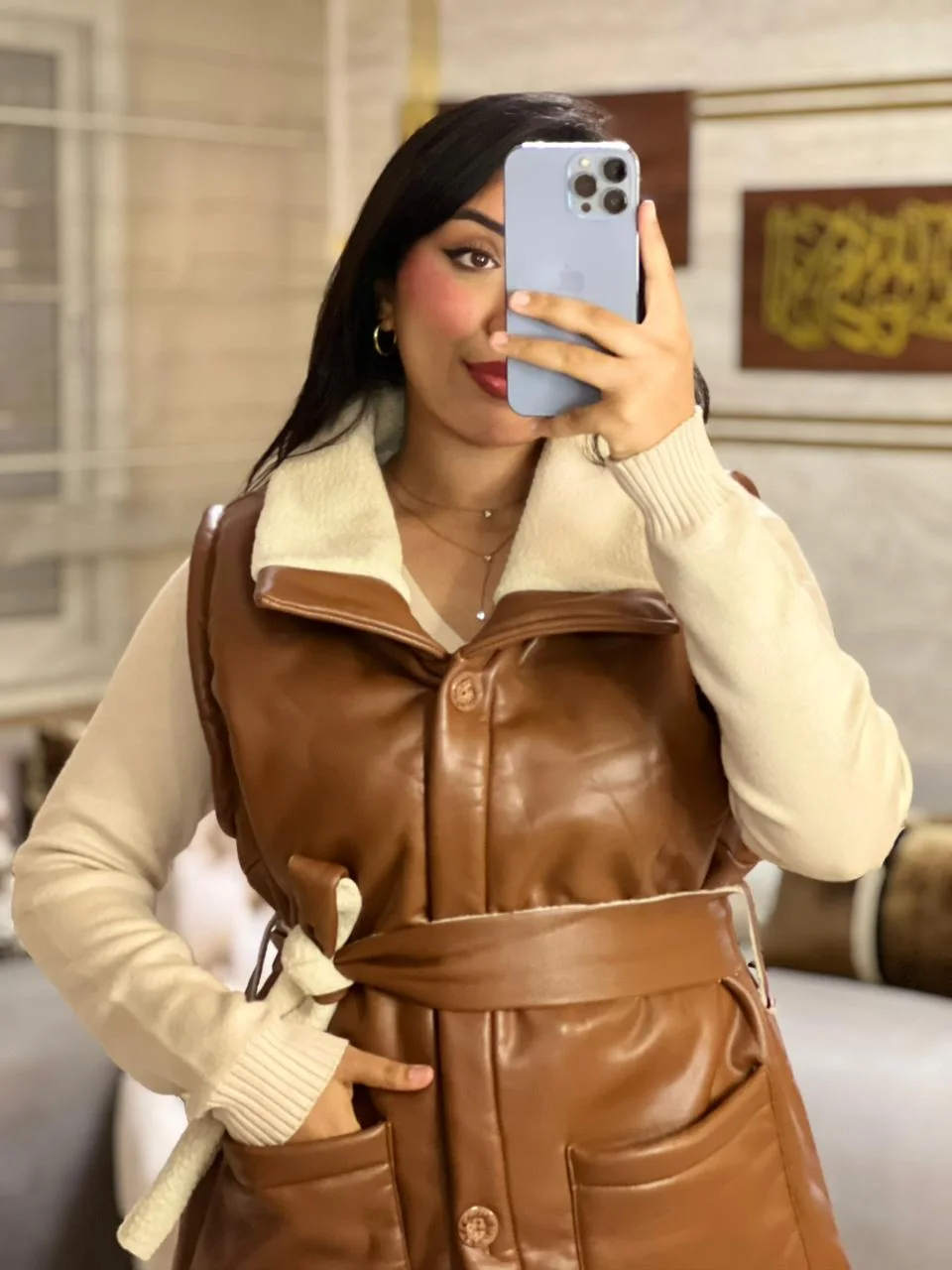 Gilet long effet cuir ceinturé