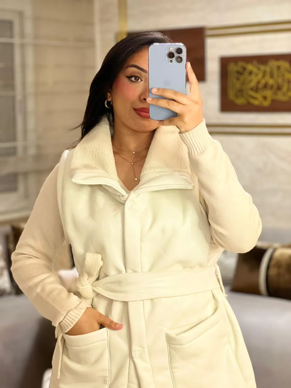 Gilet long effet cuir ceinturé