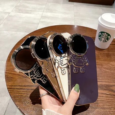 حافظه لامعه علي شكل رائد فضائي لهواتف ايفون