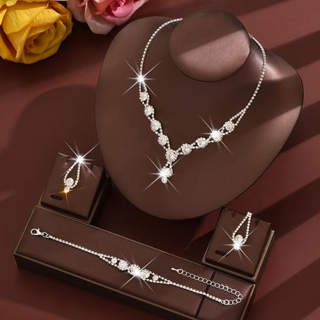 قلادة + زوج من الأقراط + مجموعة أساور مجوهرات