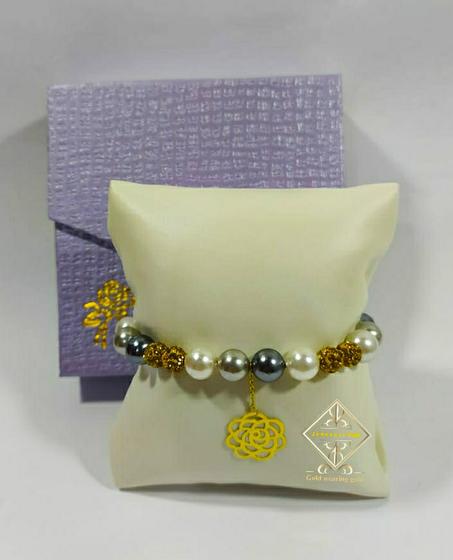 bracelet avec pendentif en or (gr62)