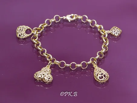 Bracelet en plaqué or jaune pour femme - Gourmette charms