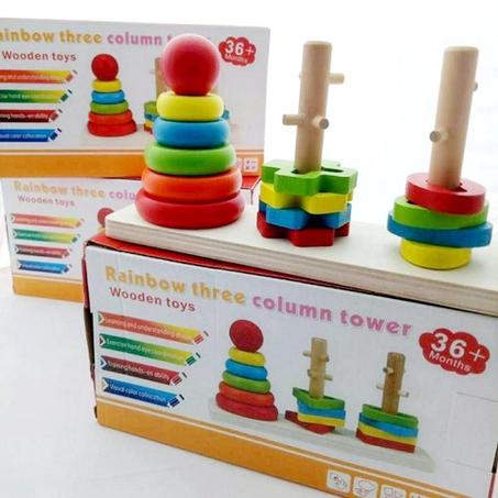 لعبة خشبية على شكل ثلاثة أعمدة متعددة الألوان