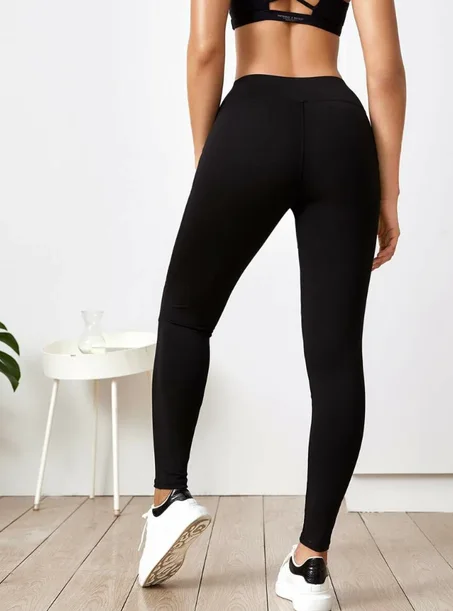 Legging de sport unicolore avec pièces transparentes