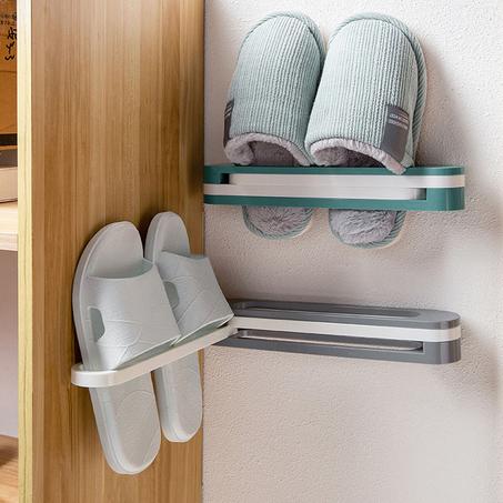 رف مثبت على الحائط ينظم تخزين الأحذية قابل للطي - A wall-mounted shelf organizes shoe storage