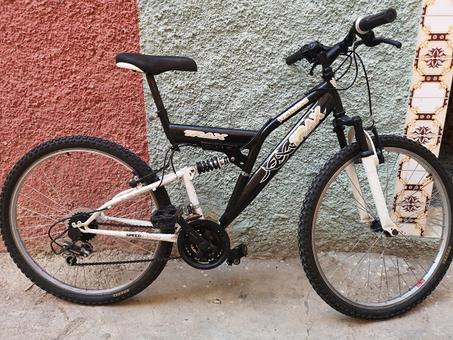 vélo VTT TRAX speed noir et blanc avec ressort